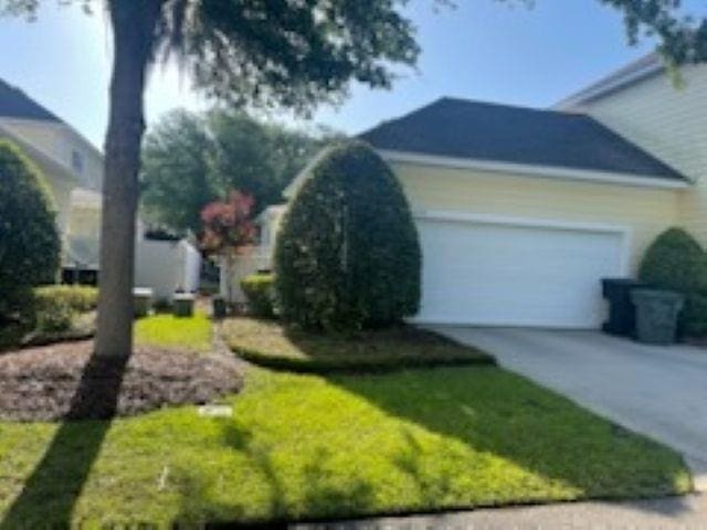 4270 Avon Park Cir, Tallahassee, FL 32311 - view of home's exterior with an attached garage and driveway