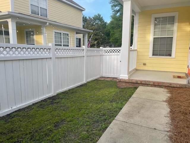 4270 Avon Park Cir, Tallahassee, FL 32311 - living room with plenty of natural light, wood finished floors, and a ceiling fan