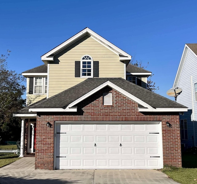 view of side of home with a garage