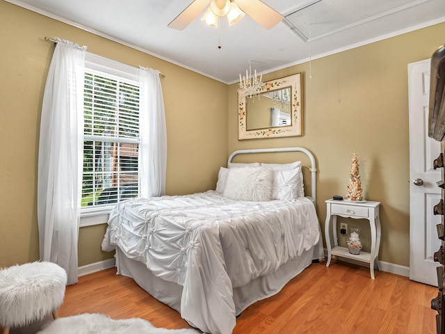 3104 Oak Hammock Ln Unit U, Tallahassee, FL 32301 - bedroom with attic access, multiple windows, wood finished floors, ornamental molding, and a ceiling fan
