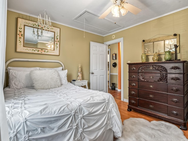 3104 Oak Hammock Ln Unit U, Tallahassee, FL 32301 - bedroom featuring attic access, wood finished floors, ornamental molding, and a ceiling fan