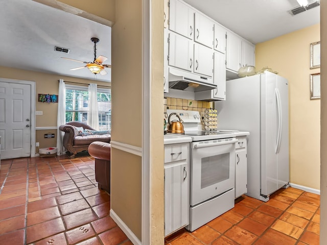 3104 Oak Hammock Ln Unit U, Tallahassee, FL 32301 - kitchen featuring white range with electric cooktop, a ceiling fan, decorative backsplash, under cabinet range hood, and light countertops