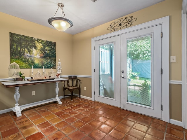 3104 Oak Hammock Ln Unit U, Tallahassee, FL 32301 - doorway to outside with french doors and tile patterned flooring