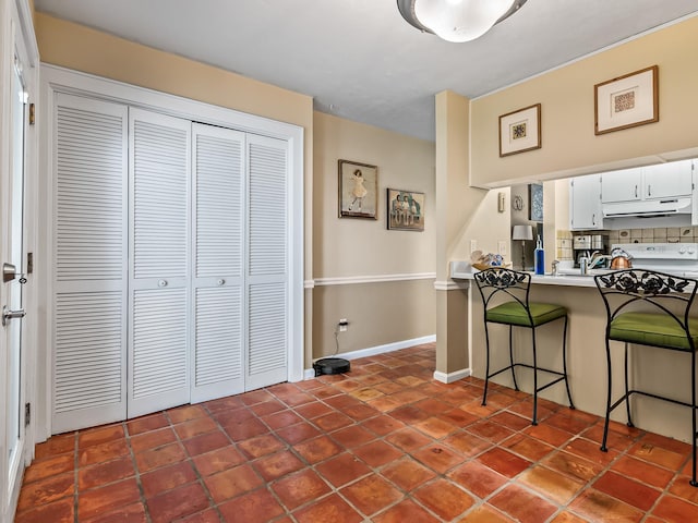 3104 Oak Hammock Ln Unit U, Tallahassee, FL 32301 - interior space featuring dark tile patterned flooring and baseboards
