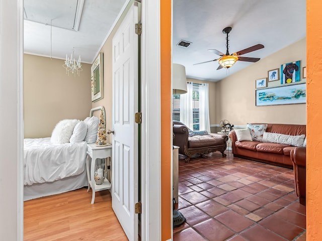 3104 Oak Hammock Ln Unit U, Tallahassee, FL 32301 - bedroom featuring attic access, ceiling fan, and lofted ceiling