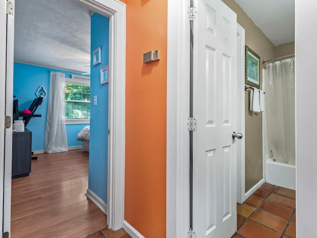 3104 Oak Hammock Ln Unit U, Tallahassee, FL 32301 - corridor with baseboards and wood finished floors