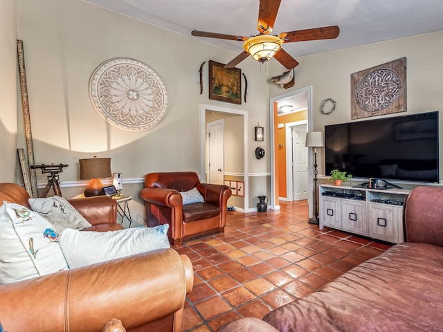 3104 Oak Hammock Ln Unit U, Tallahassee, FL 32301 - living room with ceiling fan, dark tile patterned floors, and lofted ceiling