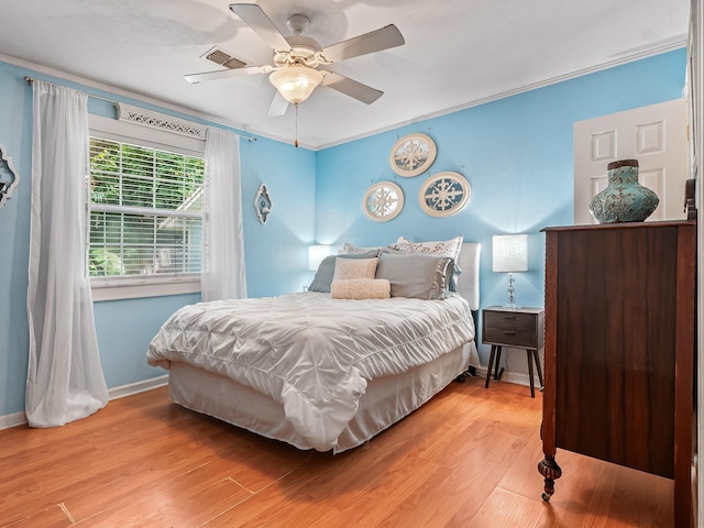 3104 Oak Hammock Ln Unit U, Tallahassee, FL 32301 - bedroom featuring wood finished floors, ornamental molding, and a ceiling fan