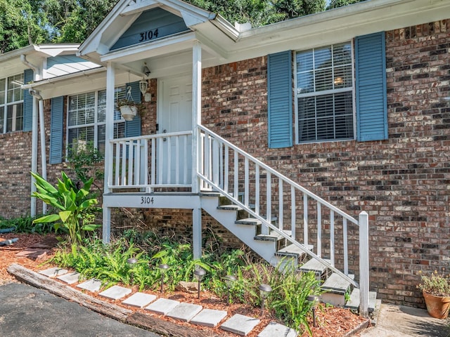 3104 Oak Hammock Ln Unit U, Tallahassee, FL 32301 - view of exterior entry featuring brick siding