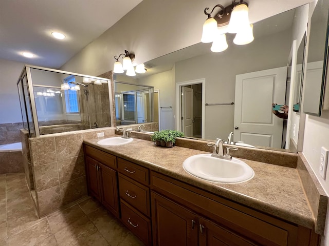 2541 Lagrange Trl, Tallahassee, FL 32312 - bathroom featuring a chandelier, a shower stall, and double vanity
