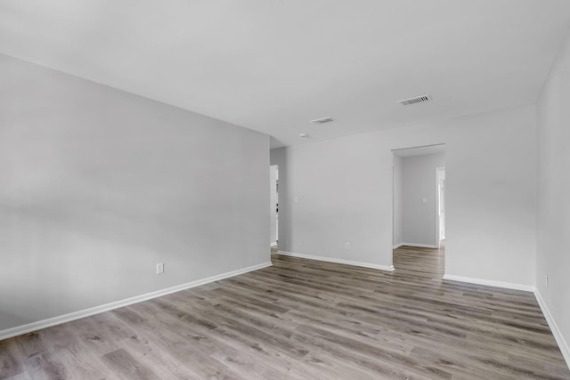 2314 Oxford Rd, Tallahassee, FL 32304 - unfurnished room featuring wood finished floors and baseboards