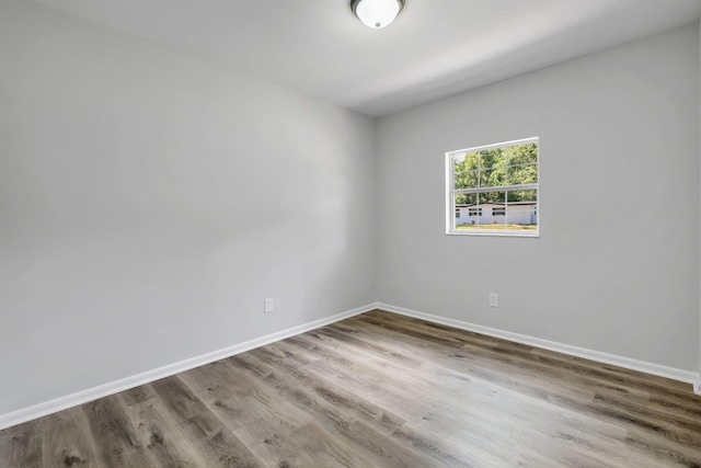 2314 Oxford Rd, Tallahassee, FL 32304 - empty room featuring wood finished floors and baseboards