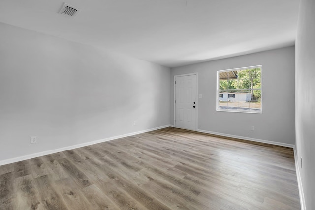 2314 Oxford Rd, Tallahassee, FL 32304 - unfurnished room with wood finished floors and baseboards