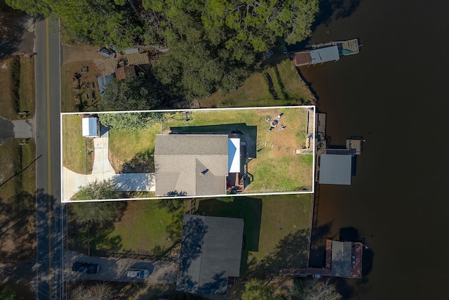 24252 Lanier St, Tallahassee, FL 32310 - view of front facade with fence, driveway, a front yard, and a carport