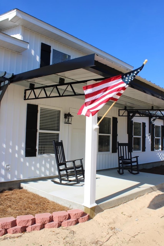 doorway to property with a porch