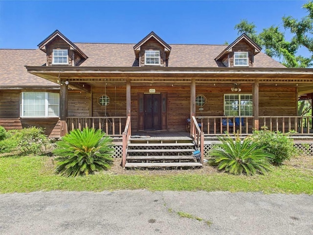 3696 Joel Aman Rd, Perry, FL 32347 - view of front of home featuring a porch and a shingled roof