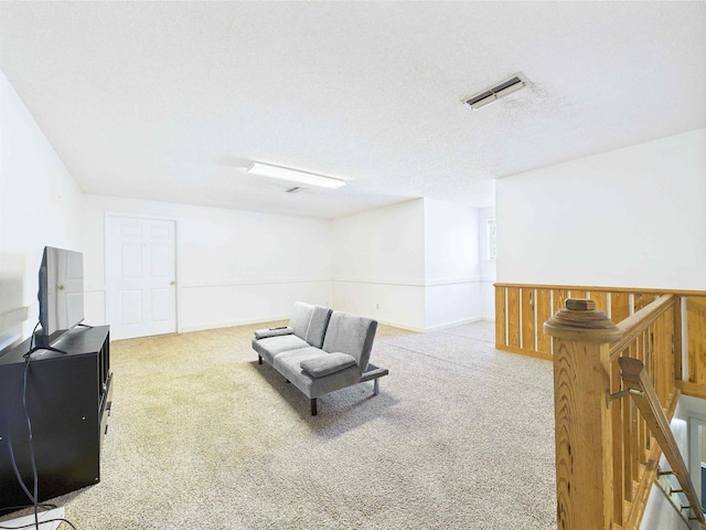 3696 Joel Aman Rd, Perry, FL 32347 - sitting room featuring an upstairs landing and carpet floors