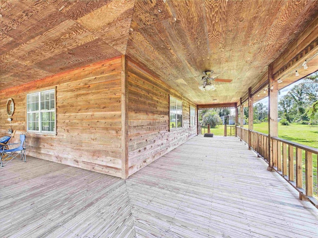 3696 Joel Aman Rd, Perry, FL 32347 - deck with a ceiling fan and a lawn
