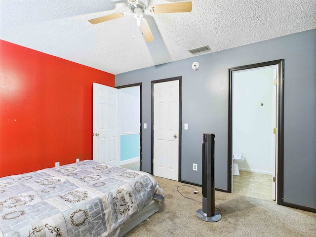 3696 Joel Aman Rd, Perry, FL 32347 - bedroom featuring a textured ceiling, carpet, a ceiling fan, and baseboards