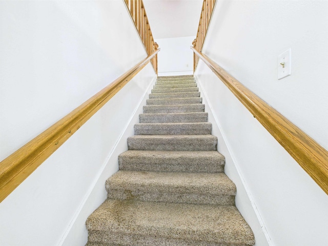 3696 Joel Aman Rd, Perry, FL 32347 - stairs featuring carpet flooring