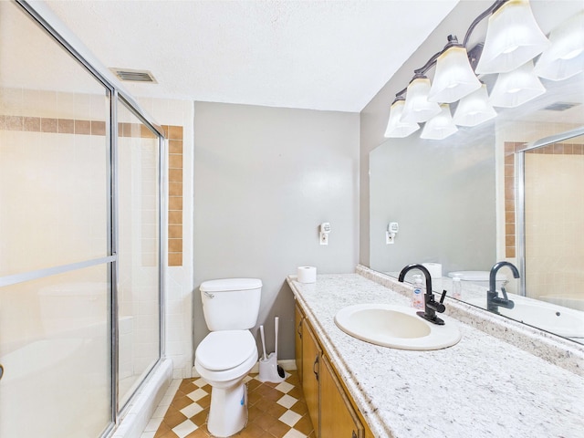 3696 Joel Aman Rd, Perry, FL 32347 - full bathroom featuring a stall shower, toilet, and vanity