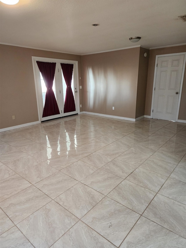 spare room with ornamental molding