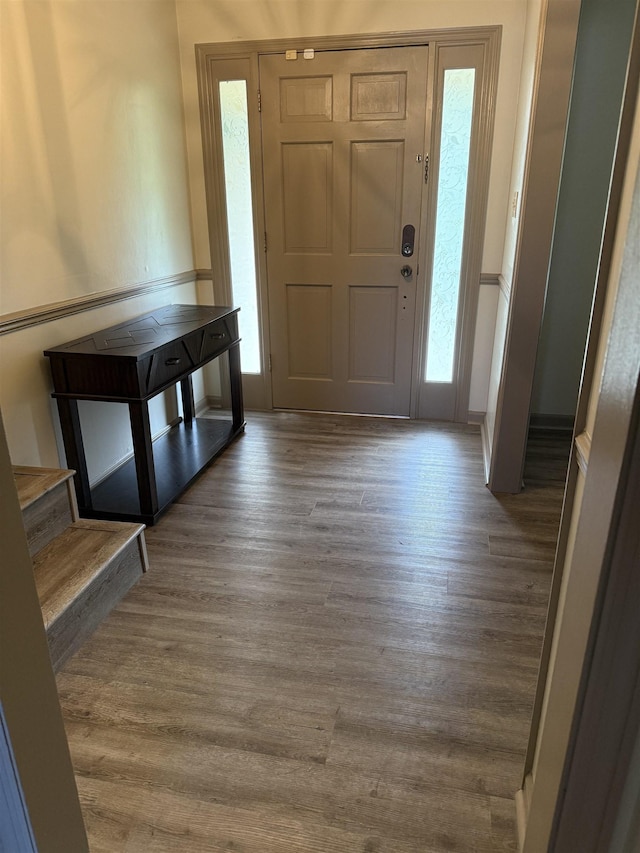 3726 Wicklow Cir, Tallahassee, FL 32309 - foyer entrance with plenty of natural light, wood finished floors, and stairs