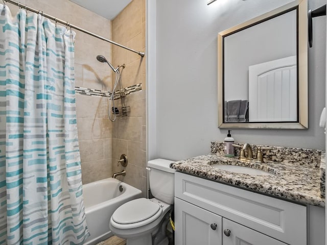 full bathroom featuring vanity, shower / tub combo with curtain, and toilet