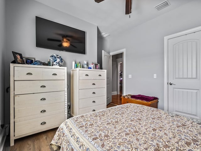 bedroom featuring ceiling fan and hardwood / wood-style floors