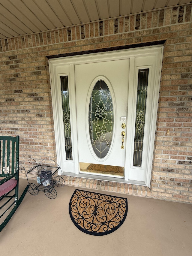601 Judson Dr, Perry, FL 32348 - entrance to property with brick siding and a porch