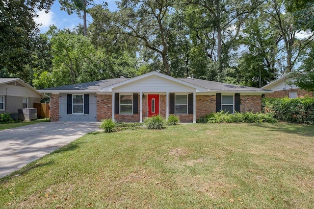 single story home with central AC unit and a front yard