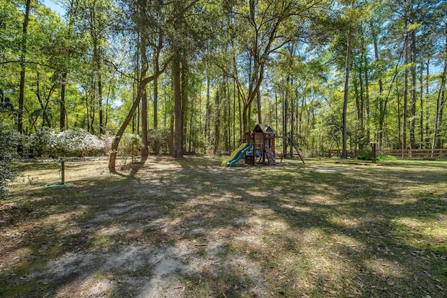 2227 Ten Oaks Dr, Tallahassee, FL 32312 - view of yard with a playground