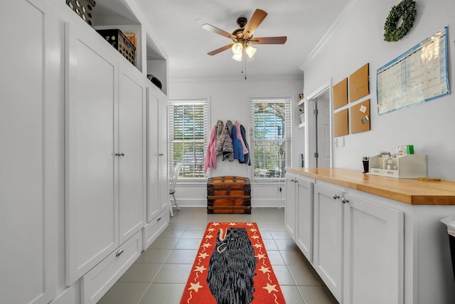 2227 Ten Oaks Dr, Tallahassee, FL 32312 - interior space featuring crown molding, baseboards, ceiling fan, tile patterned floors, and vanity