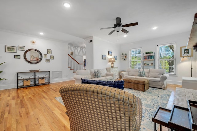 2227 Ten Oaks Dr, Tallahassee, FL 32312 - living room featuring ornamental molding, stairway, ceiling fan, and wood finished floors