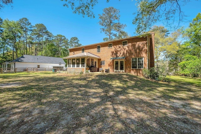 2227 Ten Oaks Dr, Tallahassee, FL 32312 - rear view of property with a yard and fence