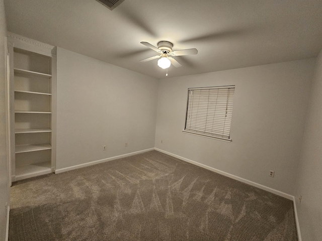 2943 Tewkesbury Trce, Tallahassee, FL 32309 - spare room with ceiling fan, dark carpet, and baseboards