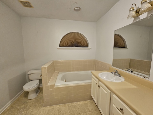 2943 Tewkesbury Trce, Tallahassee, FL 32309 - full bathroom featuring toilet, a garden tub, and vanity