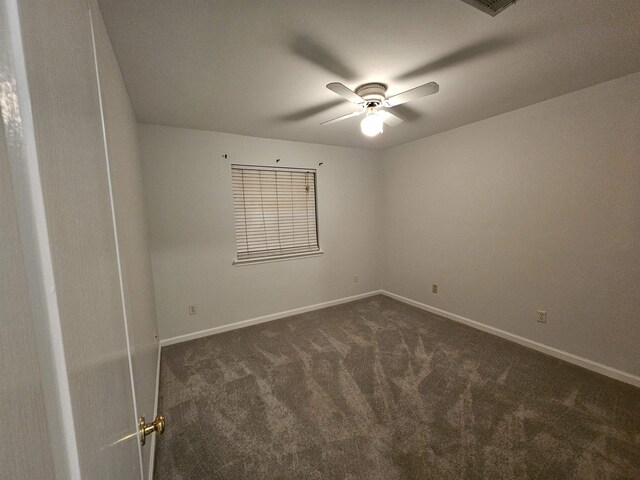 2943 Tewkesbury Trce, Tallahassee, FL 32309 - empty room with dark colored carpet, ceiling fan, and baseboards