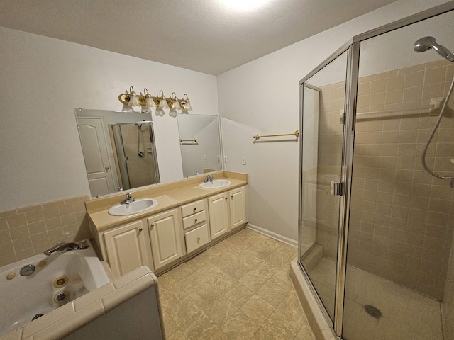 2943 Tewkesbury Trce, Tallahassee, FL 32309 - full bathroom featuring a stall shower, double vanity, and a whirlpool tub