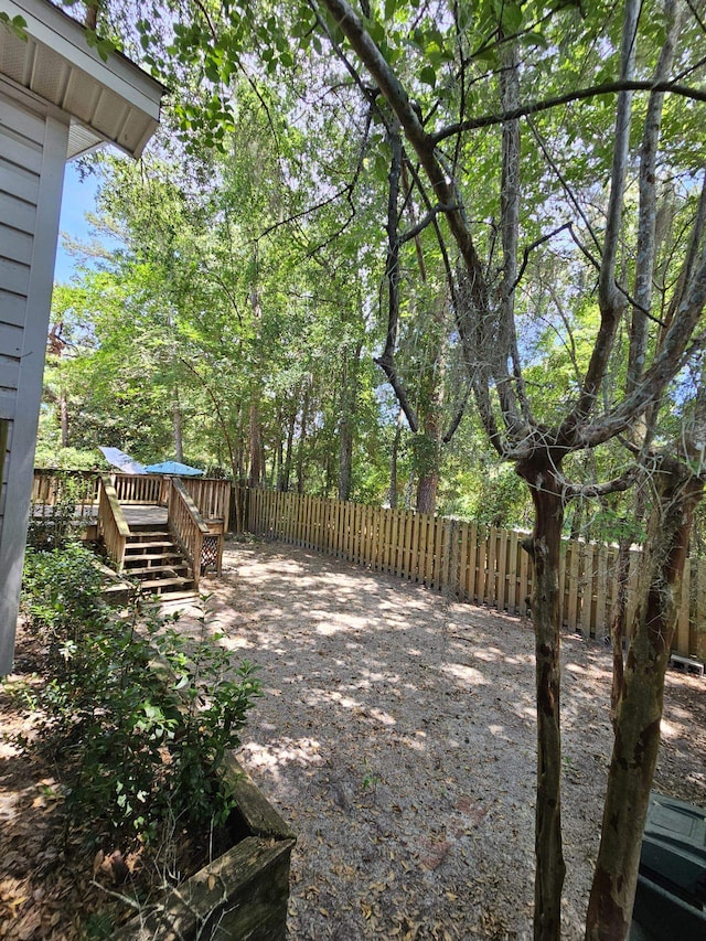 2943 Tewkesbury Trce, Tallahassee, FL 32309 - fenced backyard with a deck