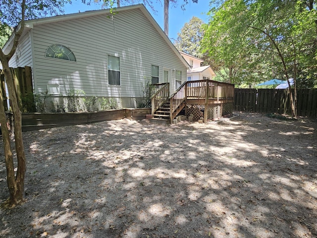 2943 Tewkesbury Trce, Tallahassee, FL 32309 - rear view of property featuring a wooden deck