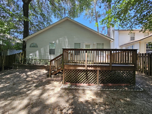 2943 Tewkesbury Trce, Tallahassee, FL 32309 - back of house with a wooden deck