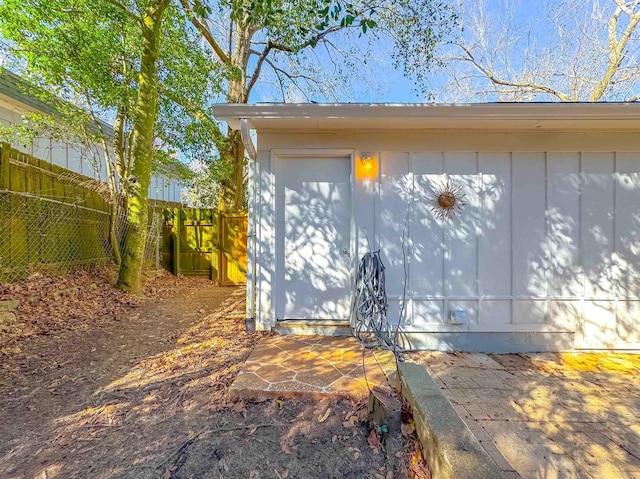 garage with fence