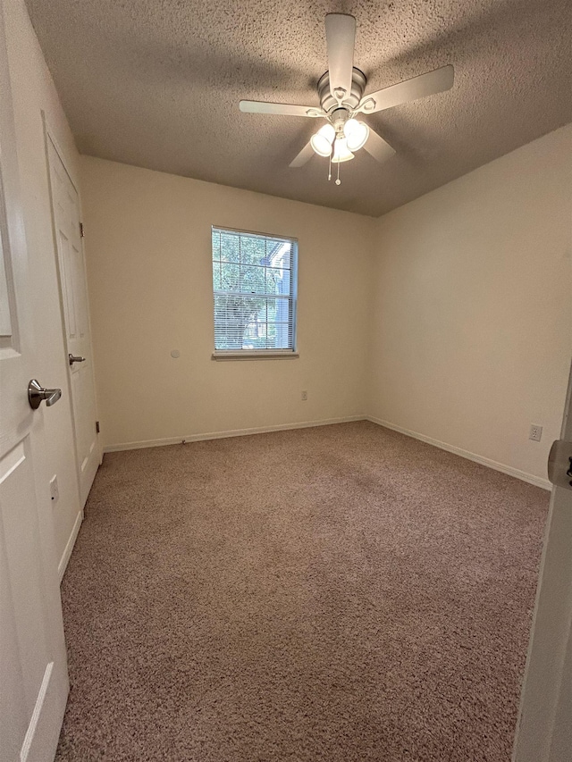 6842 Tomy Lee Trl, Tallahassee, FL 32309 - empty room featuring carpet, a textured ceiling, ceiling fan, and baseboards