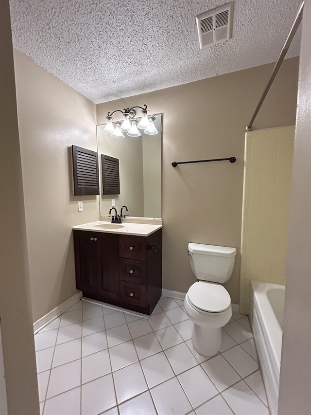 6842 Tomy Lee Trl, Tallahassee, FL 32309 - bathroom with a textured ceiling, toilet, vanity, bathing tub / shower combination, and tile patterned flooring