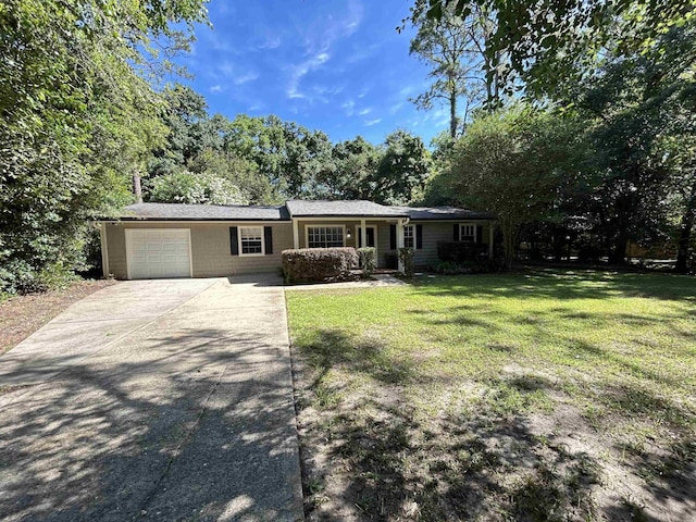 6842 Tomy Lee Trl, Tallahassee, FL 32309 - ranch-style house with an attached garage, concrete driveway, and a front lawn