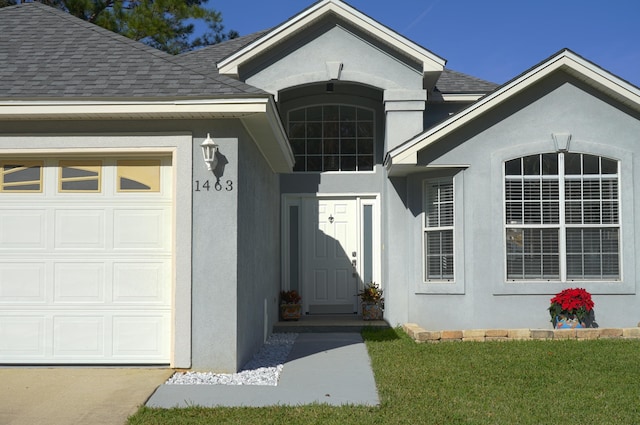 property entrance featuring a garage