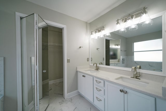 bathroom with vanity and walk in shower