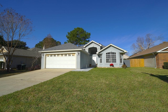 ranch-style house with a garage and a front yard