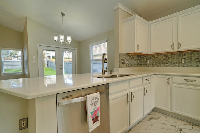 kitchen with white cabinetry, dishwasher, french doors, sink, and kitchen peninsula